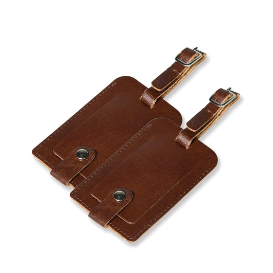 Dark brown leather luggage tags set of 2 with silver buckle closures on Tampa Home & Garden Store
