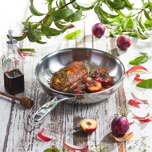 Deep frying pan stainless steel skillet with roasted meat and plums, Michelin Chef Team on Tampa Home & Garden Store