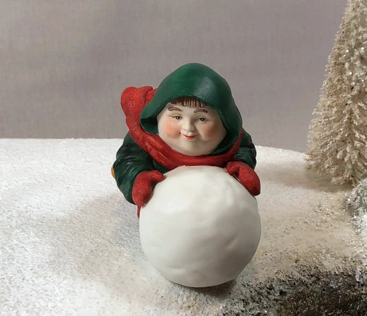Dept 56 Monks Christmas figure: green hooded monk with red scarf on snowball, set of three on Tampa Home & Garden Store