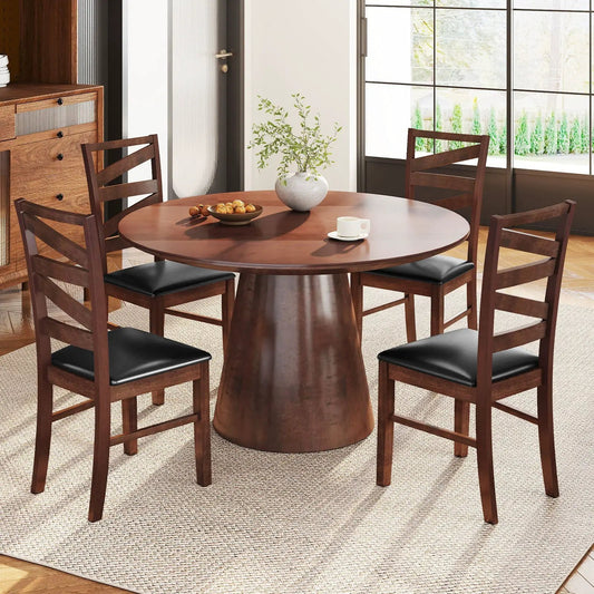 Dining chairs set of 6 with walnut wood legs and black padded seats around a round dining table on Tampa Home & Garden Store