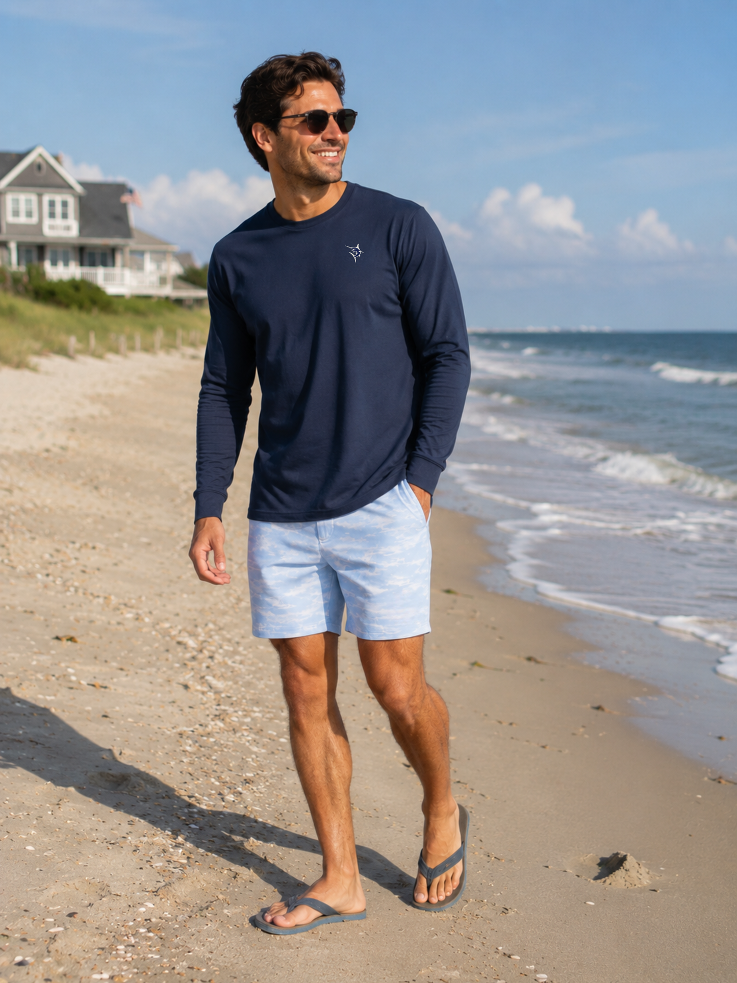 Dockside Performance Long Sleeve navy activewear top with White Water Life logo on chest on Tampa Home & Garden Store