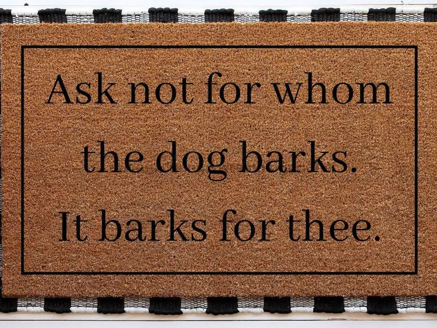 Dog Doormat brown coir with black text reading Ask not for whom the dog barks it barks for thee on Tampa Home & Garden Store