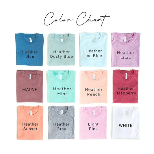 Dog Mom T Shirt color chart showing 12 folded tees in Heather Blue to White on Tampa Home & Garden Store