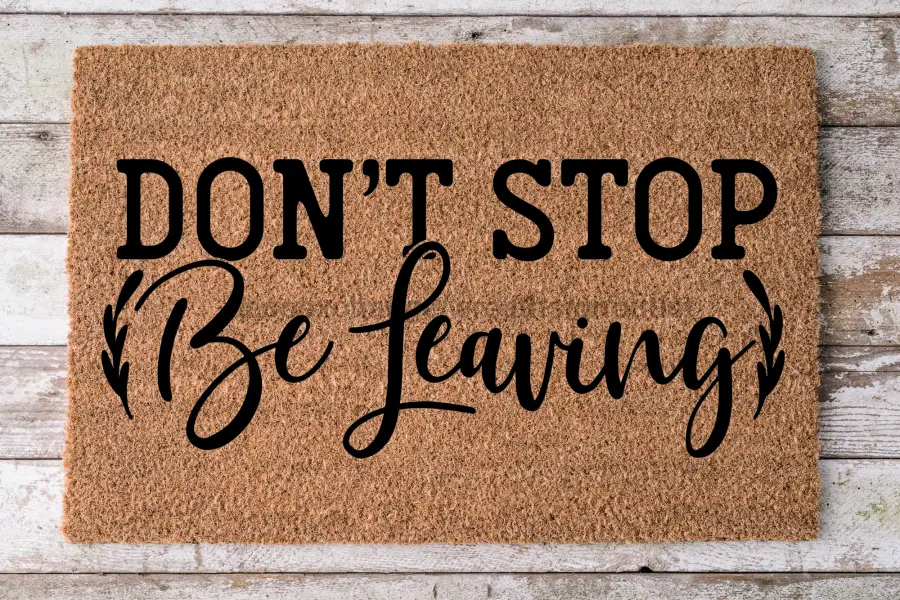 Door mat Don't Stop Be Leaving, 18x30 coir with bold black script on brown on Tampa Home & Garden Store
