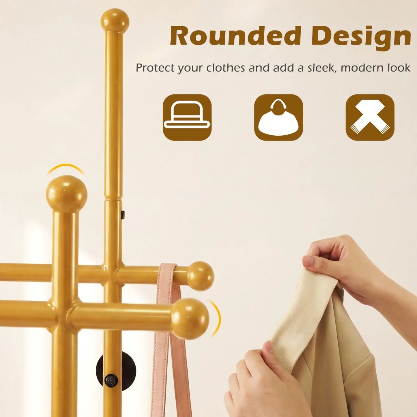 Gold double-rod garment rack with rounded finials hanging beige coat on Tampa Home & Garden Store
