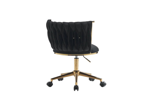Ergonomic office chair with black tufted upholstery and gold metal base with adjustable wheels on Tampa Home & Garden Store