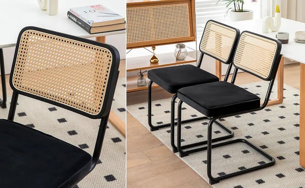 Set of 2 Velvet wicker dining chairs with black cushions and cane backs on black metal frames on Tampa Home & Garden Store