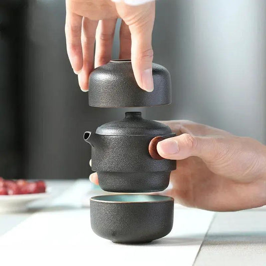 Black pottery tea set for 1 to 2 with stacked teapot and cup in matte finish for outdoor use on Tampa Home & Garden Store