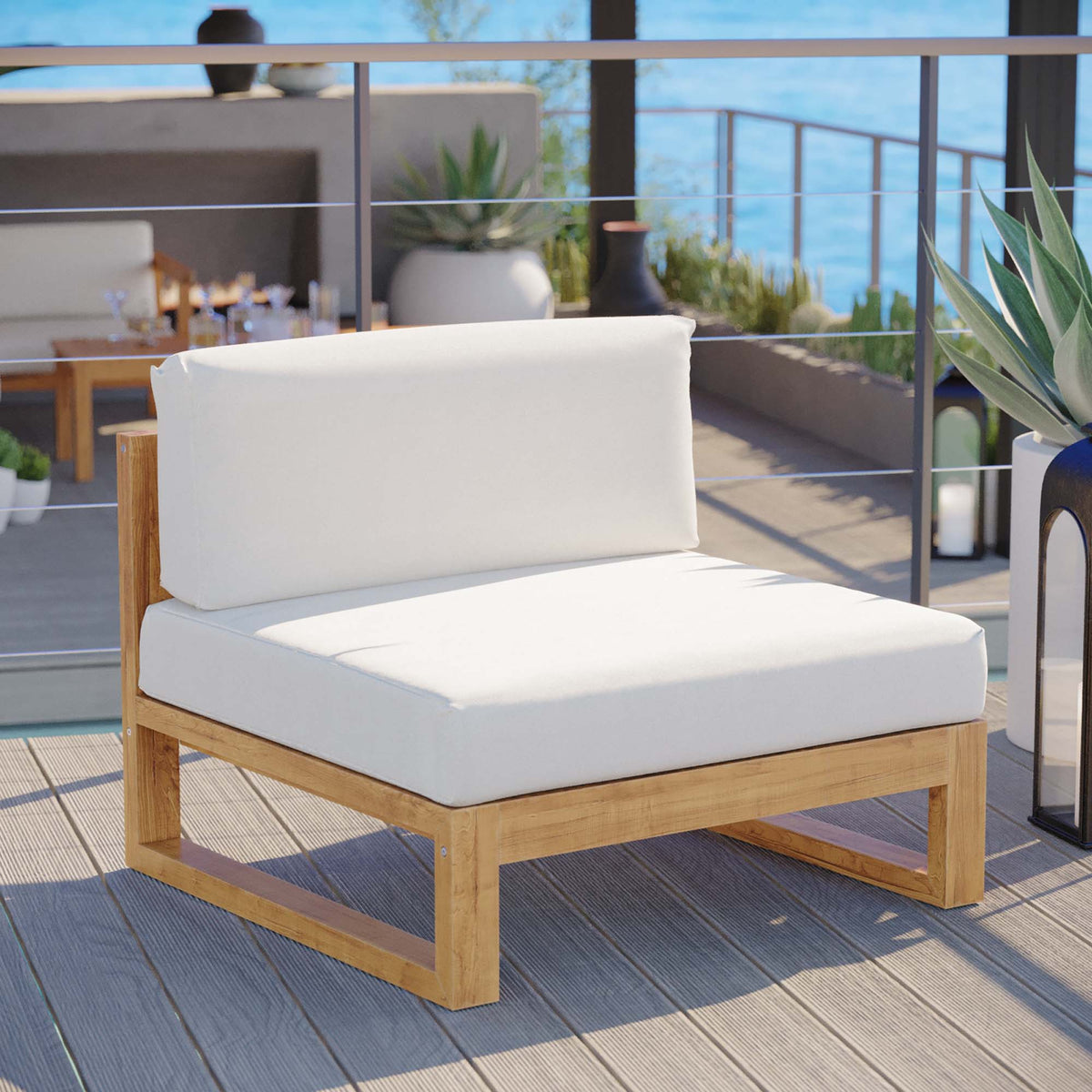 Upland outdoor teak wood armless chair with white cushions on Tampa Home & Garden Store