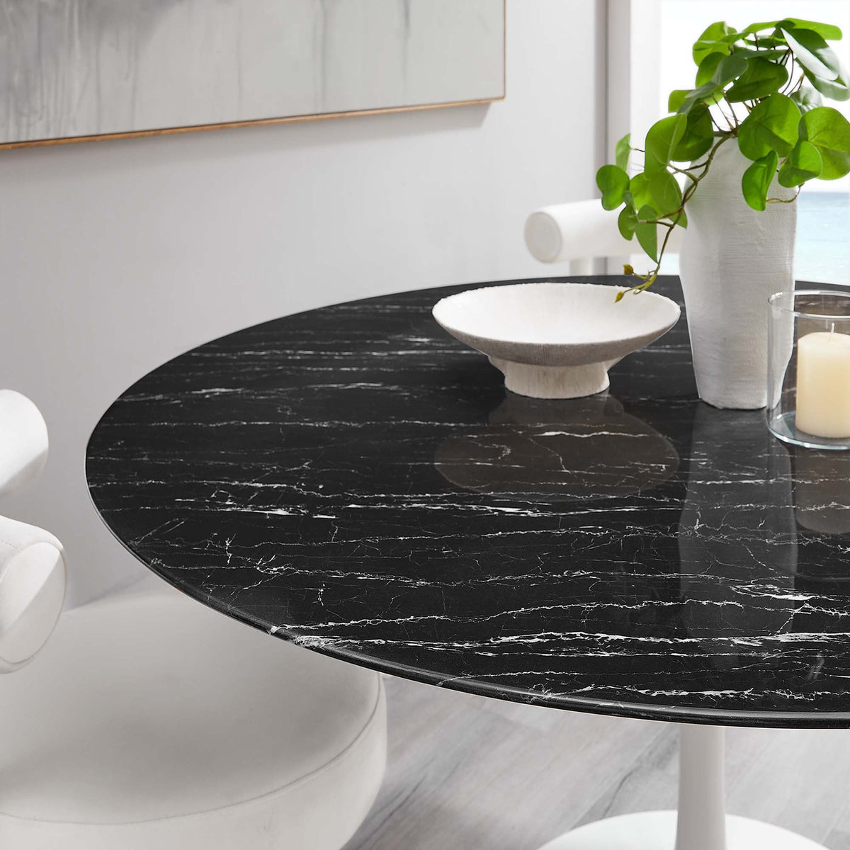 Lippa 60in round faux marble dining table with black veined top and white pedestal base on Tampa Home & Garden Store