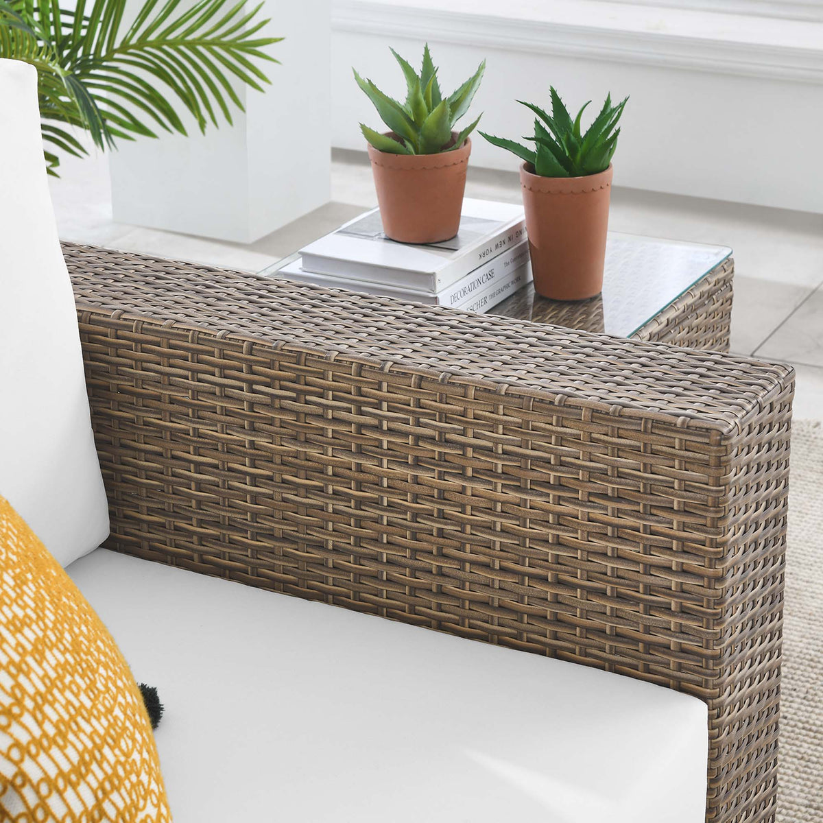 Convene Outdoor Patio Armchair by Modway on brown wicker coffee table with two potted succulents on Tampa Home & Garden Store