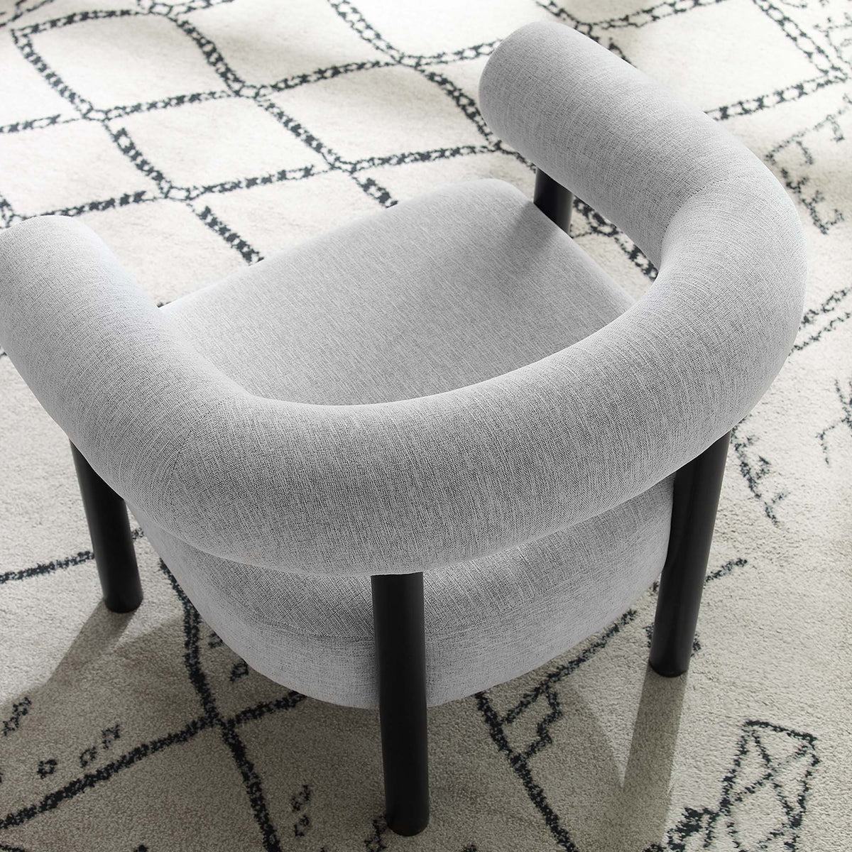 Sable upholstered fabric armchair with curved back in light gray and black legs on Tampa Home & Garden Store