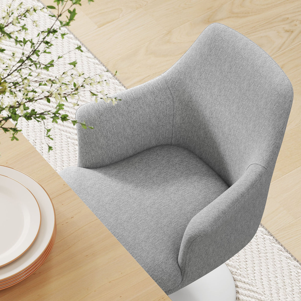 Lippa swivel dining upholstered armchair in gray fabric by Modway on wooden table on Tampa Home & Garden Store