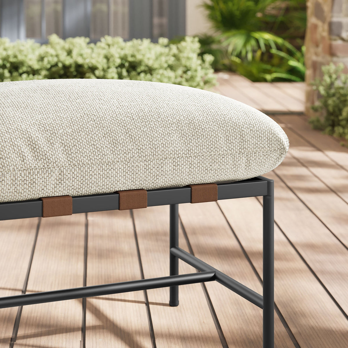 Raya outdoor boucle ottoman by HouseOfZazla with sand upholstery on a dark metal frame on Tampa Home & Garden Store