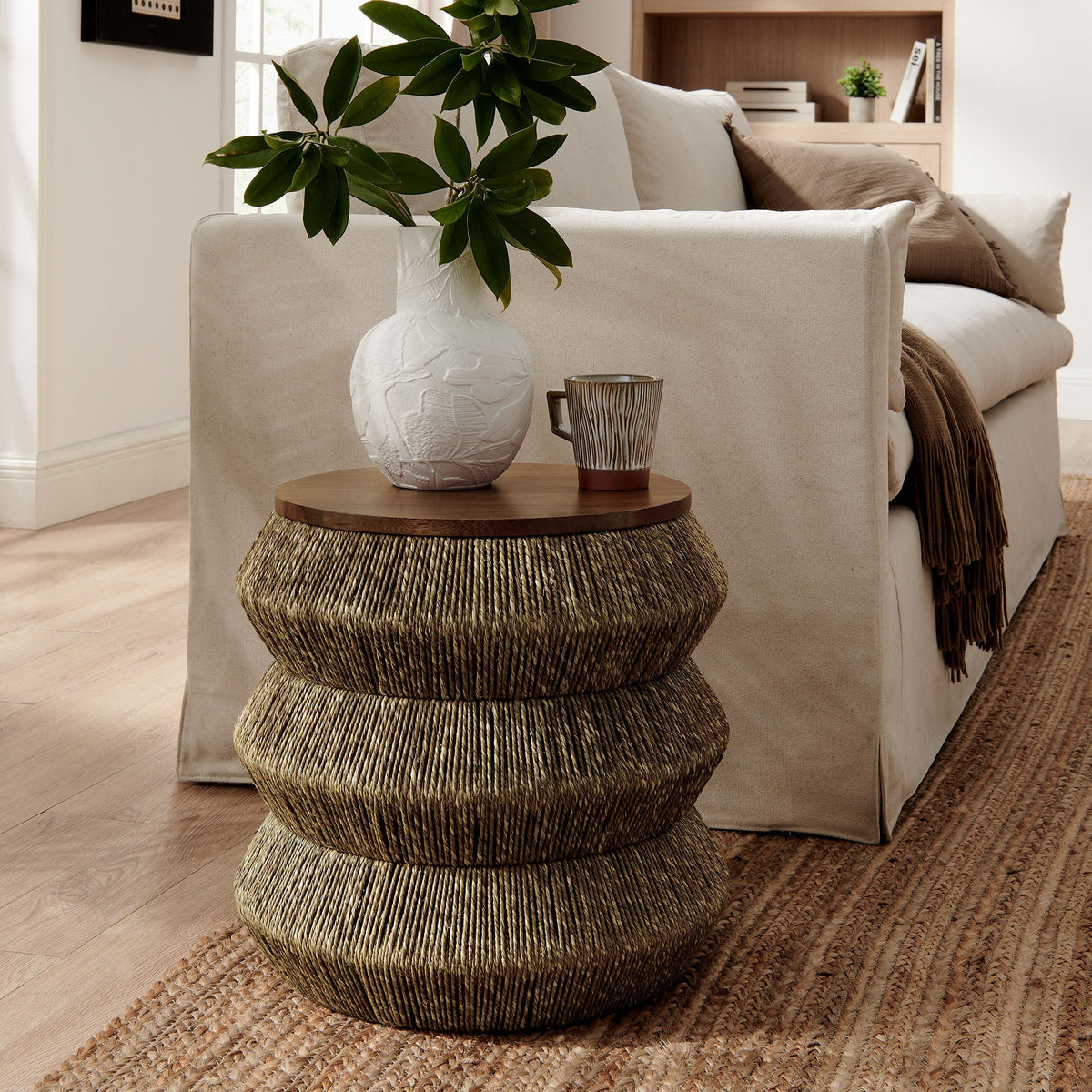 Maris Seagrass and Wood End Table with white textured vase and greenery on top on Tampa Home & Garden Store