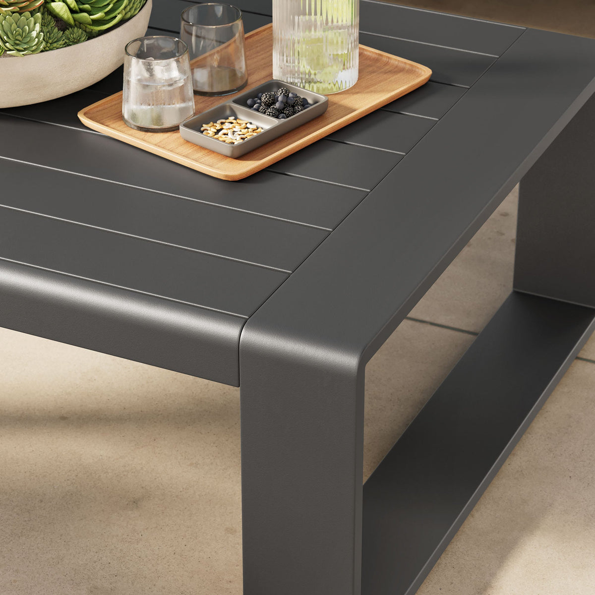 Lirienne outdoor aluminum coffee table in dark gray with slatted top by HouseOfZazla on Tampa Home & Garden Store