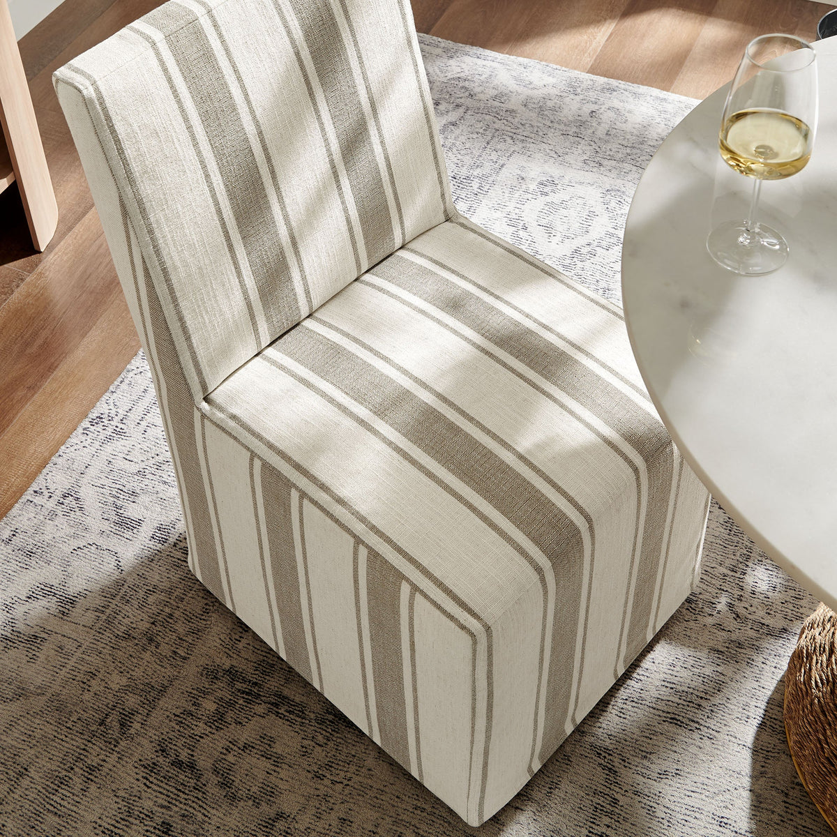Tessera striped slipcovered dining side chair in cream with taupe stripes on Tampa Home & Garden Store