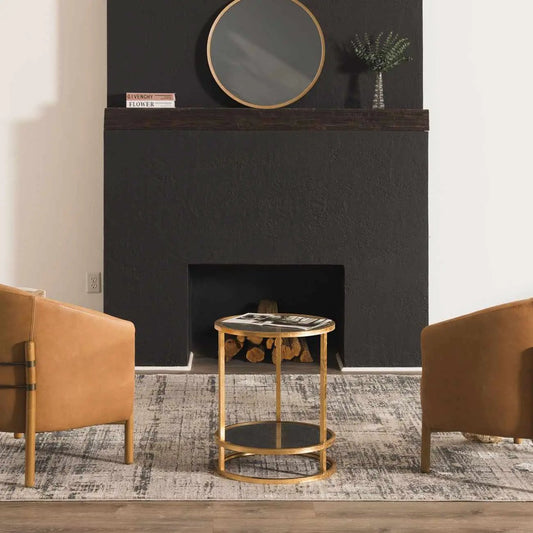 Eltham Thick Luxe Rug olive color by Boutique Rugs in a living room with a black fireplace on Tampa Home & Garden Store