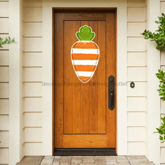 Easter Carrot Door Hanger DecoExchange on wood door orange striped carrot with green top on Tampa Home & Garden Store