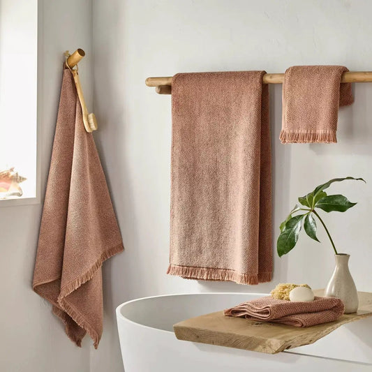 Casaluna Organic Texture Bath Towel rose color set of 3 woven towels on wooden rack on Tampa Home & Garden Store