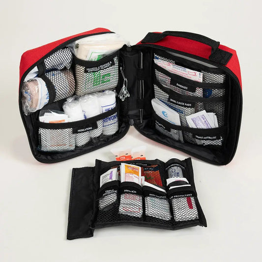Emergency Medical Kit by Emerge Survival; red/black case with pockets of bandages and meds on Tampa Home & Garden Store