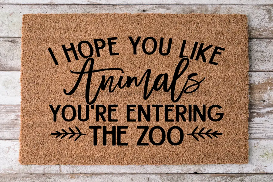 Door mat Entering the Zoo, funny coir with black text on natural background, 30x18 on Tampa Home & Garden Store