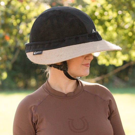 EquiVisor Original Shorty 3 sun visor with beige brim and black crown worn by a model, logo tag on Tampa Home & Garden Store