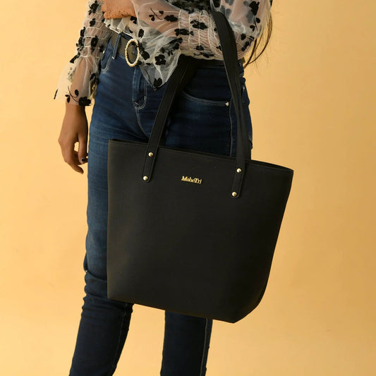 Era vegan leather tote midnight black with dual handles and gold MakeIt logo on Tampa Home & Garden Store