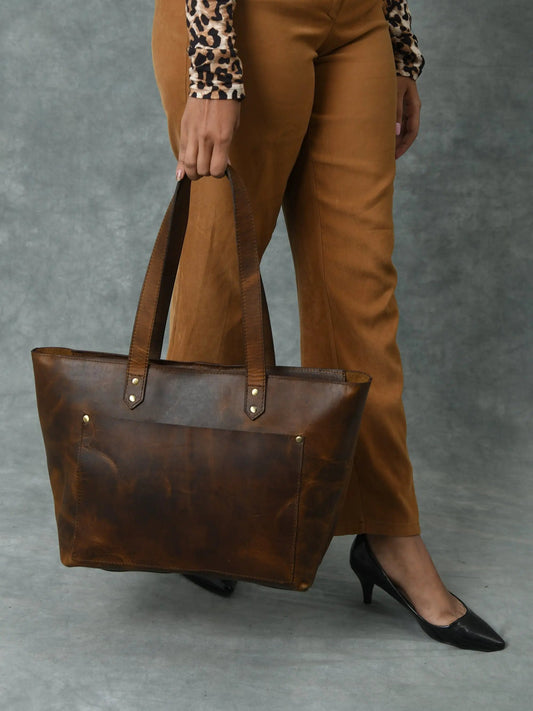 Essential Work Tote in brown leather with double handles and front pocket on Tampa Home & Garden Store