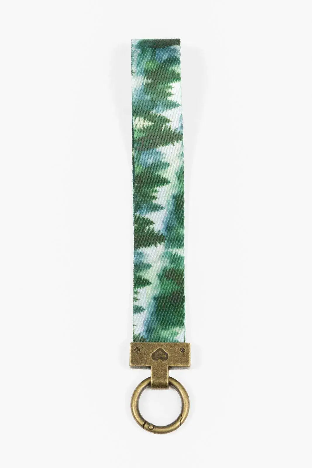 Evergreen Explorer keychain wristlet with green forest print fabric strap and brass hardware on Tampa Home & Garden Store