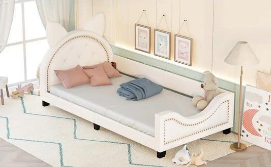 Twin size white upholstered daybed with tufted headboard and cat-ear silhouette, pink cushions on Tampa Home & Garden Store
