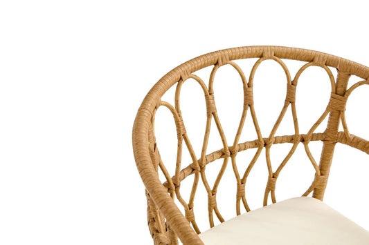 Outdoor rattan dining chair with curved woven back and cushioned seat in natural finish on Tampa Home & Garden Store