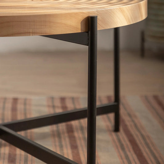 Coffee table 33 inch round with natural wood top and black metal cross legs on Tampa Home & Garden Store