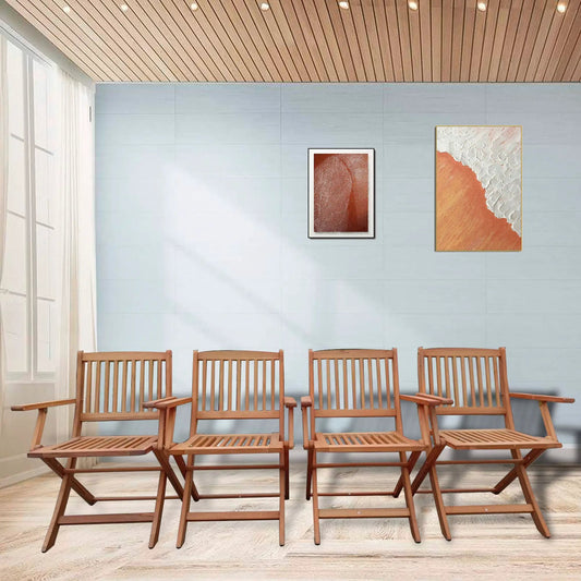 Foldable teak patio dining chairs lined up along a covered patio on Tampa Home & Garden Store