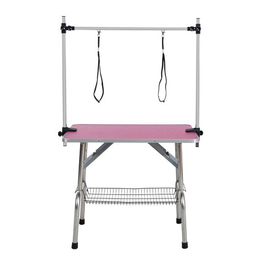 36 inch folding grooming table with pink pad, silver frame, two hanging arms on Tampa Home & Garden Store