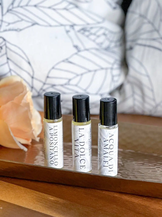 Acqua di Amalfi perfume oil Coastal Breeze roller bottles, 3 clear vials with black caps on Tampa Home & Garden Store