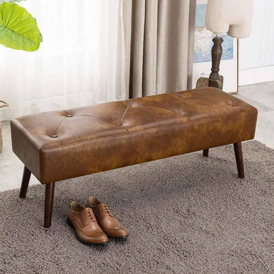 Mid-Century end-of-bed bench with brown leather tufted seat and solid wood legs on Tampa Home & Garden Store
