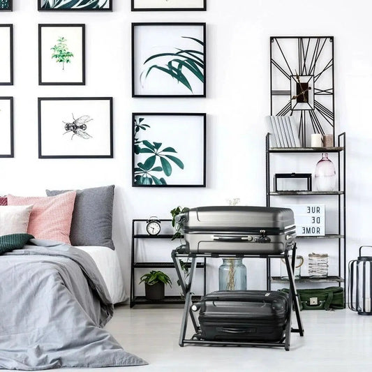 Set of 2 folding black metal luggage racks by HomePacific in a modern bedroom setup on Tampa Home & Garden Store