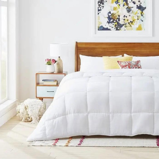 Full Size All Seasons Plush White Comforter on white bed with wood headboard on Tampa Home & Garden Store