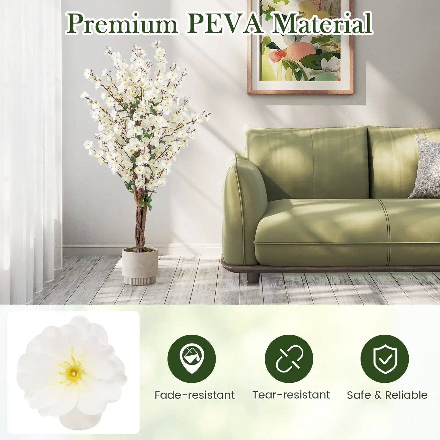 Faux plum blossom plant with white fabric flowers in a pot with braided trunk beside olive sofa on Tampa Home & Garden Store