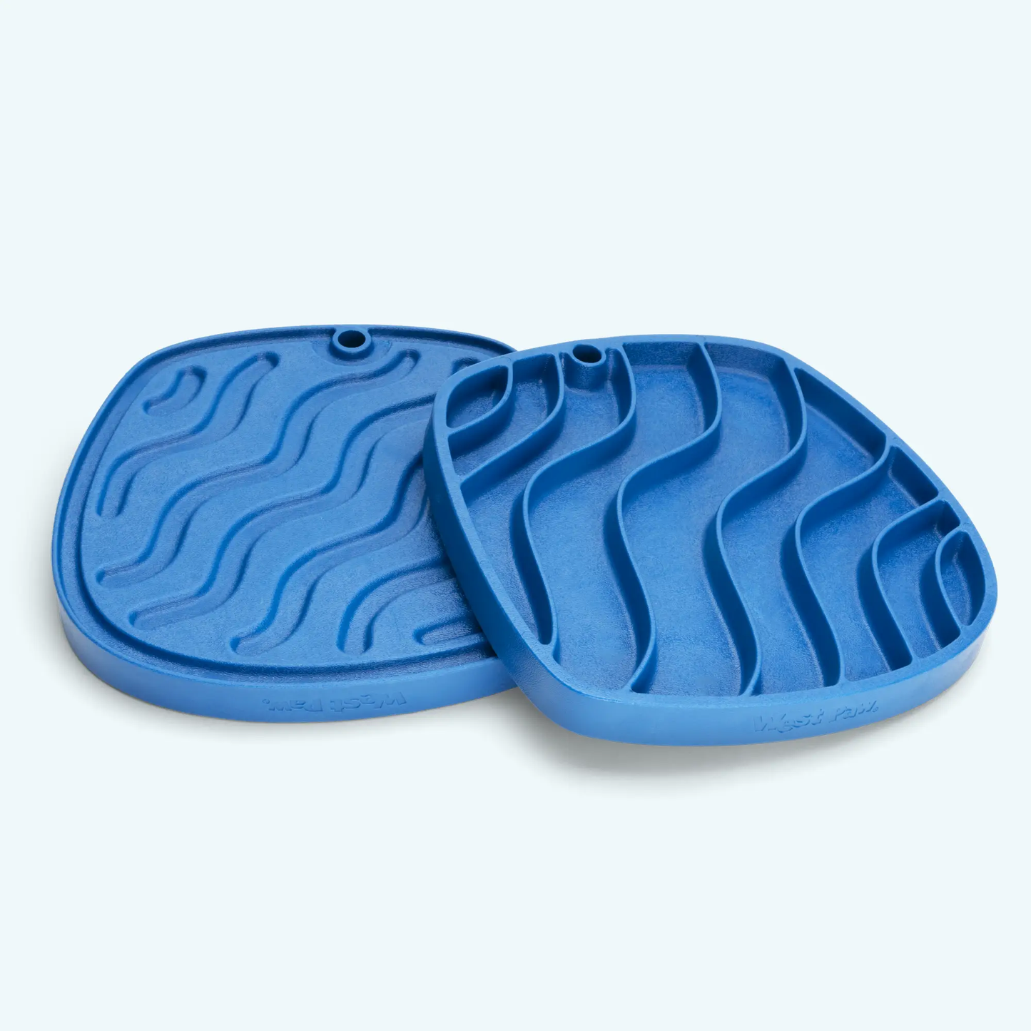Two blue West Paw Waves Feast Mats with slow feeder and lick mat design on Tampa Home & Garden Store
