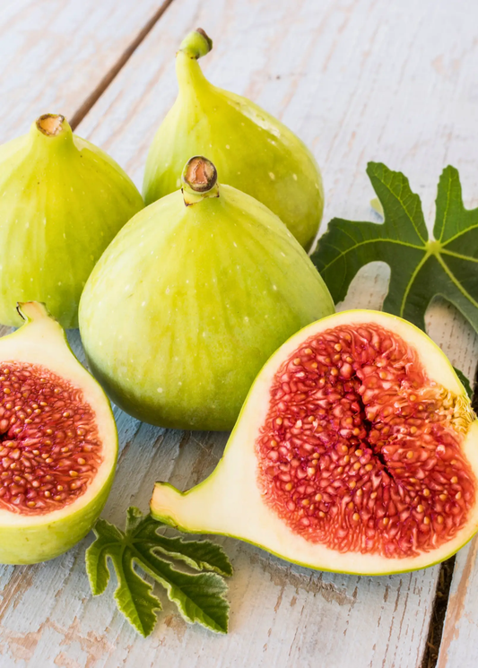 Kadota fig fruits trio with golden skin; whole and halved pieces show red interior, Sow Exotic on Tampa Home & Garden Store