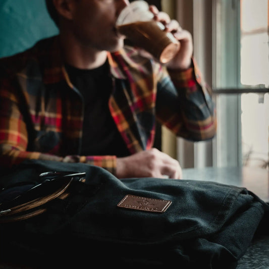 Filios Messenger Bag dark canvas with brown leather patch by White Duck Outdoors on Tampa Home & Garden Store