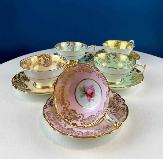 Five Piece Pastel Paragon Cups and Saucers Set with gold filigree and floral centers on Tampa Home & Garden Store