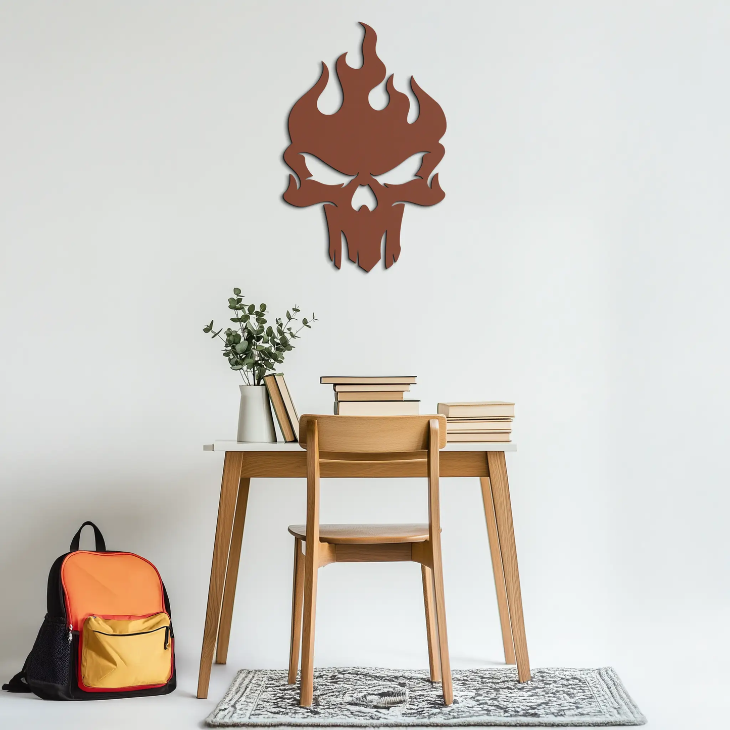 Flaming skull metal wall art with gothic flames in brown metal on white wall by Enova Art on Tampa Home & Garden Store