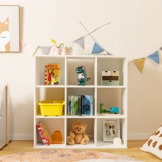 White wooden kids bookcase with storage cubbies, modular shelves filled with toys and books on Tampa Home & Garden Store