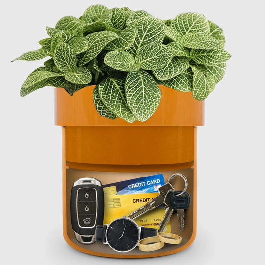 Flower Pot Hidden Safe with Lockable Compartment orange planter holds keys, cards and a watch on Tampa Home & Garden Store