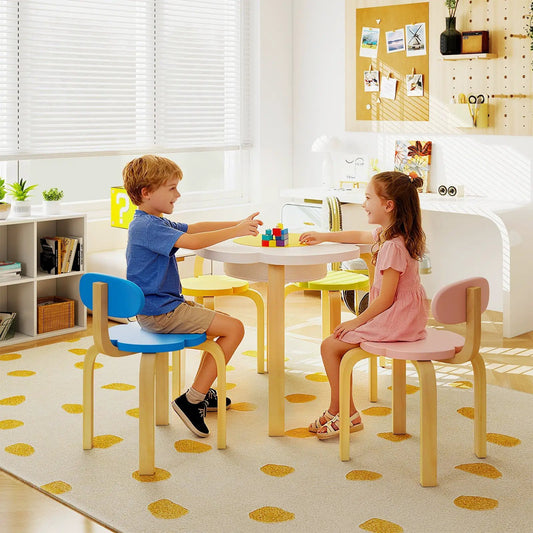 Flower-shaped wooden kids activity table set with 4 colorful chairs in blue, pink and yellow on Tampa Home & Garden Store