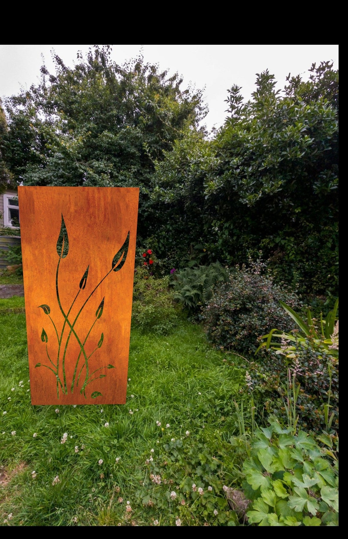 Outdoor metal privacy screen panel 46-inch rust finish leaf cutouts Rustica Ornamentals on Tampa Home & Garden Store