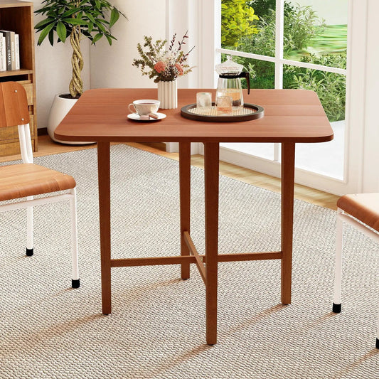 Foldable dining table for 2–4, wooden brown top and legs, compact folding design on Tampa Home & Garden Store